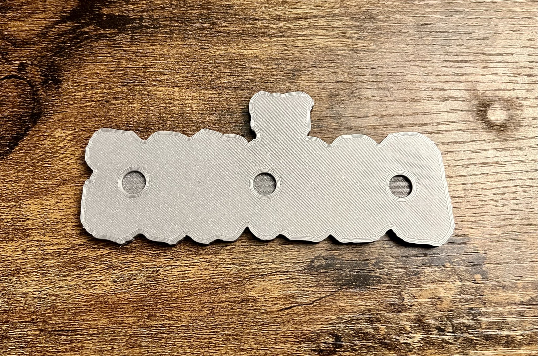 Nam châm logo Goonies kích thước 8x3mm