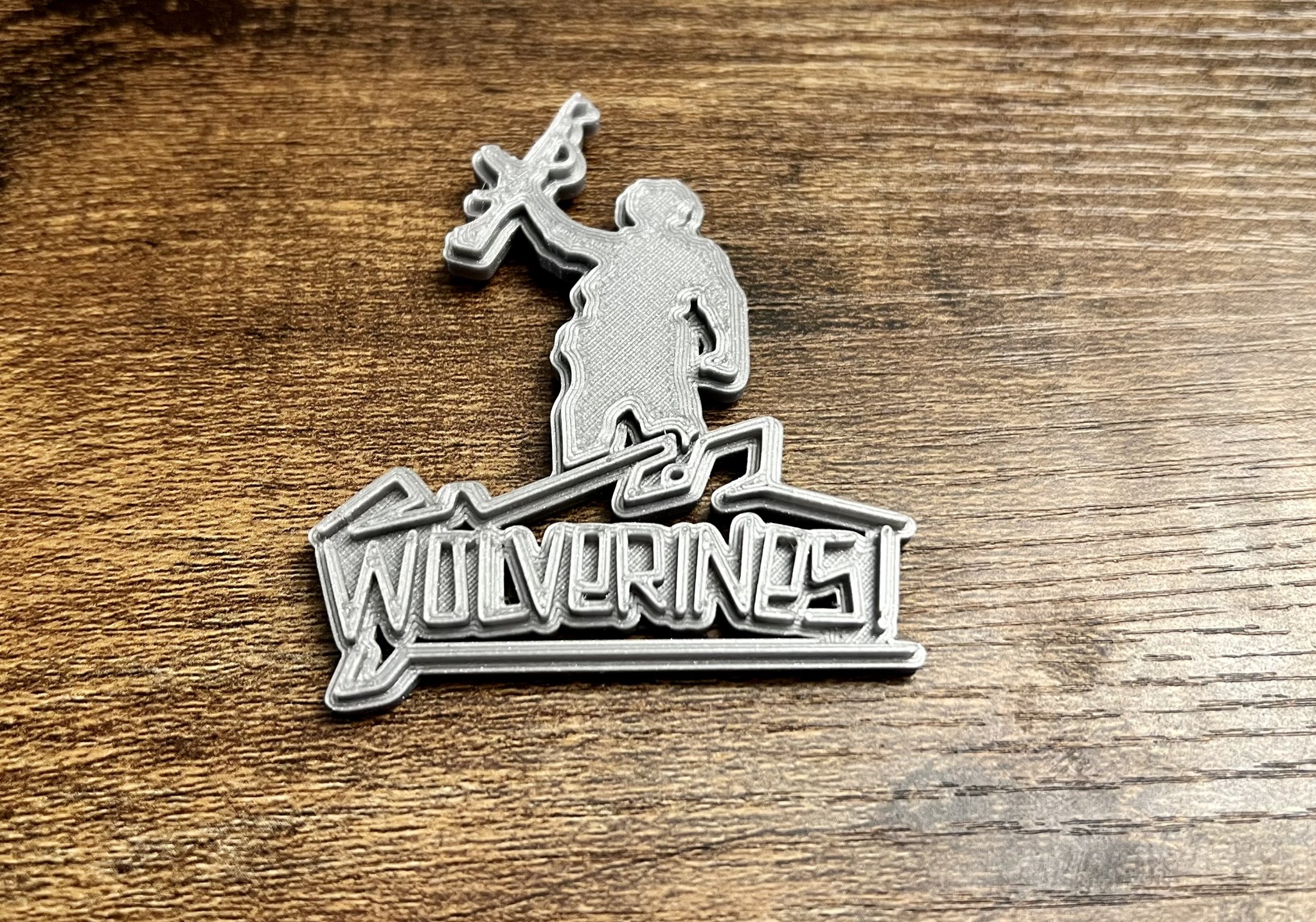 Nam châm WOLVERINES! Red Dawn kích thước 8x3mm