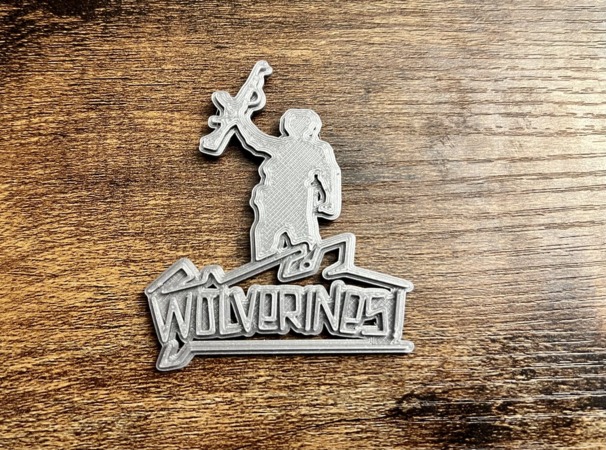 Nam châm WOLVERINES! Red Dawn kích thước 8x3mm