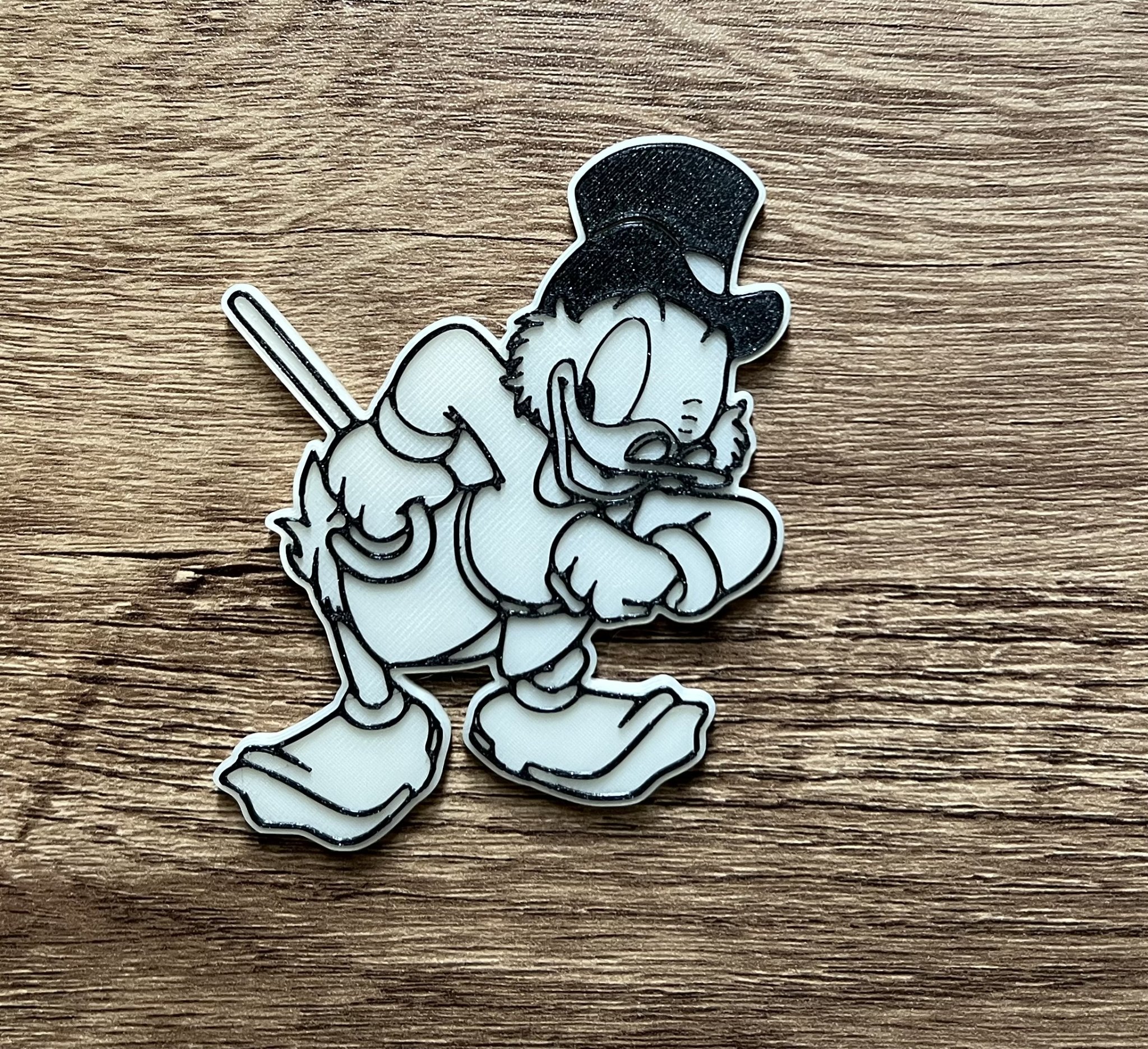Nam châm Scrooge Duck Tales kích thước 8x3mm