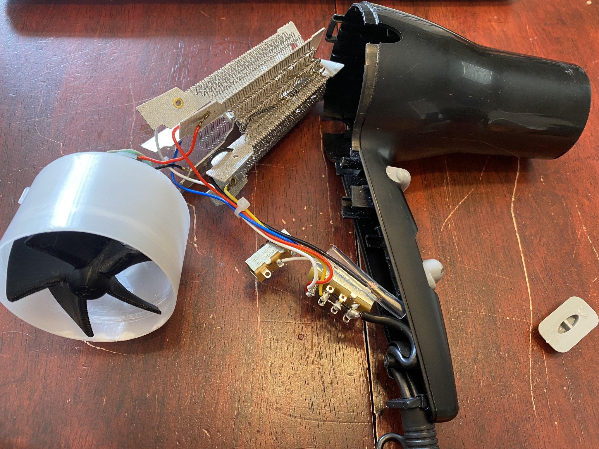 Thay thế cánh quạt cho máy sấy tóc Revlon Compact