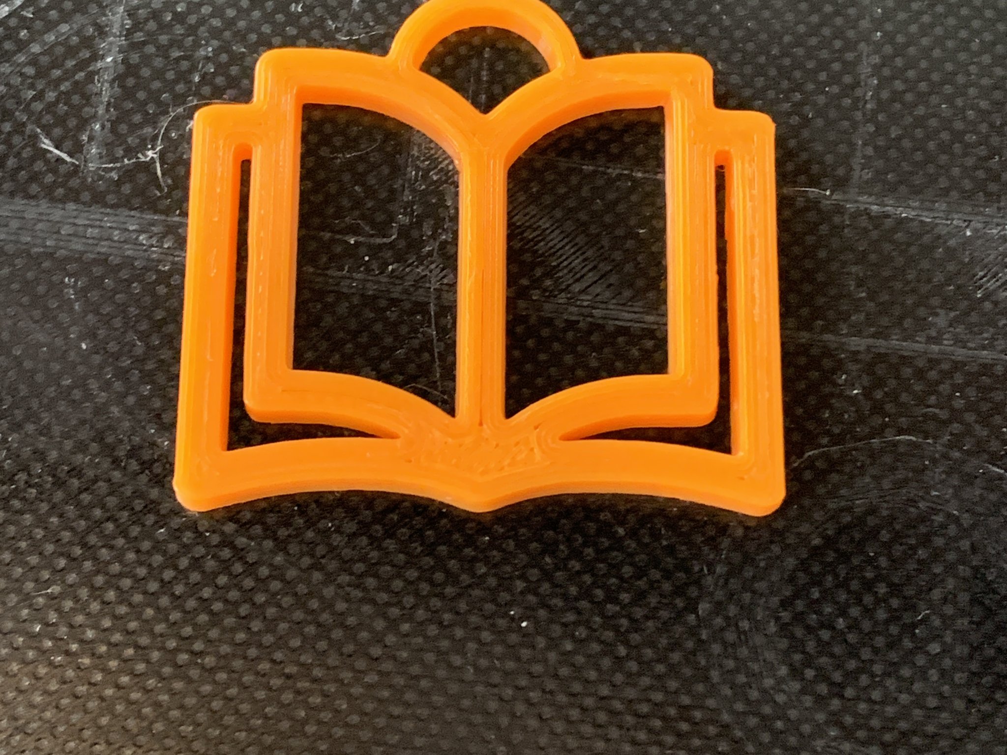 Móc khóa hình quyển sách mở dành cho người yêu sách