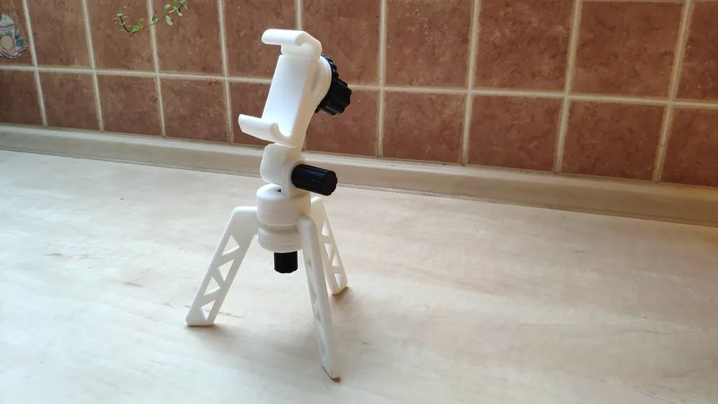 Giá đỡ điện thoại di động đa năng trên chân tripod