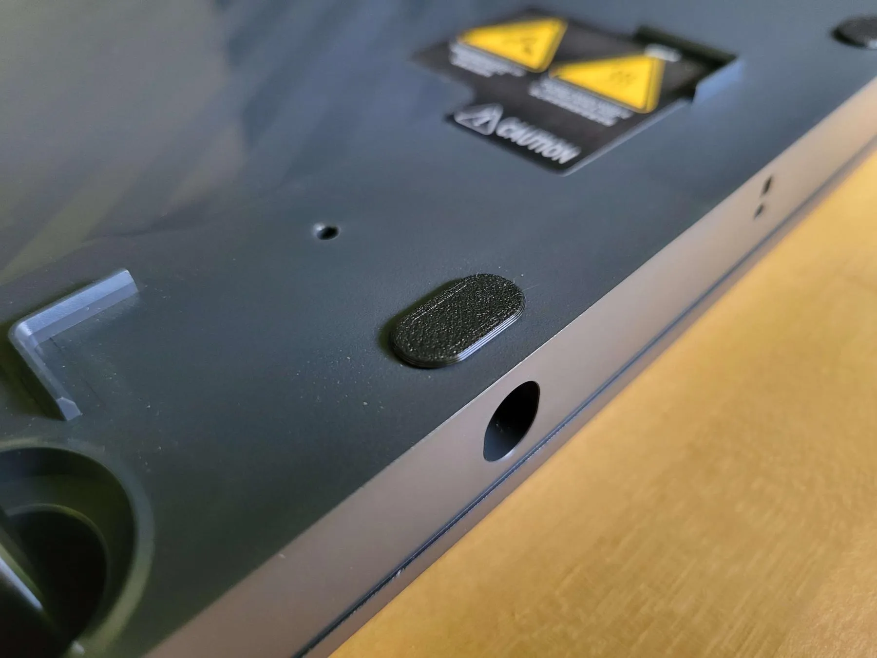 Nắp che lỗ dưới đế máy in P1P