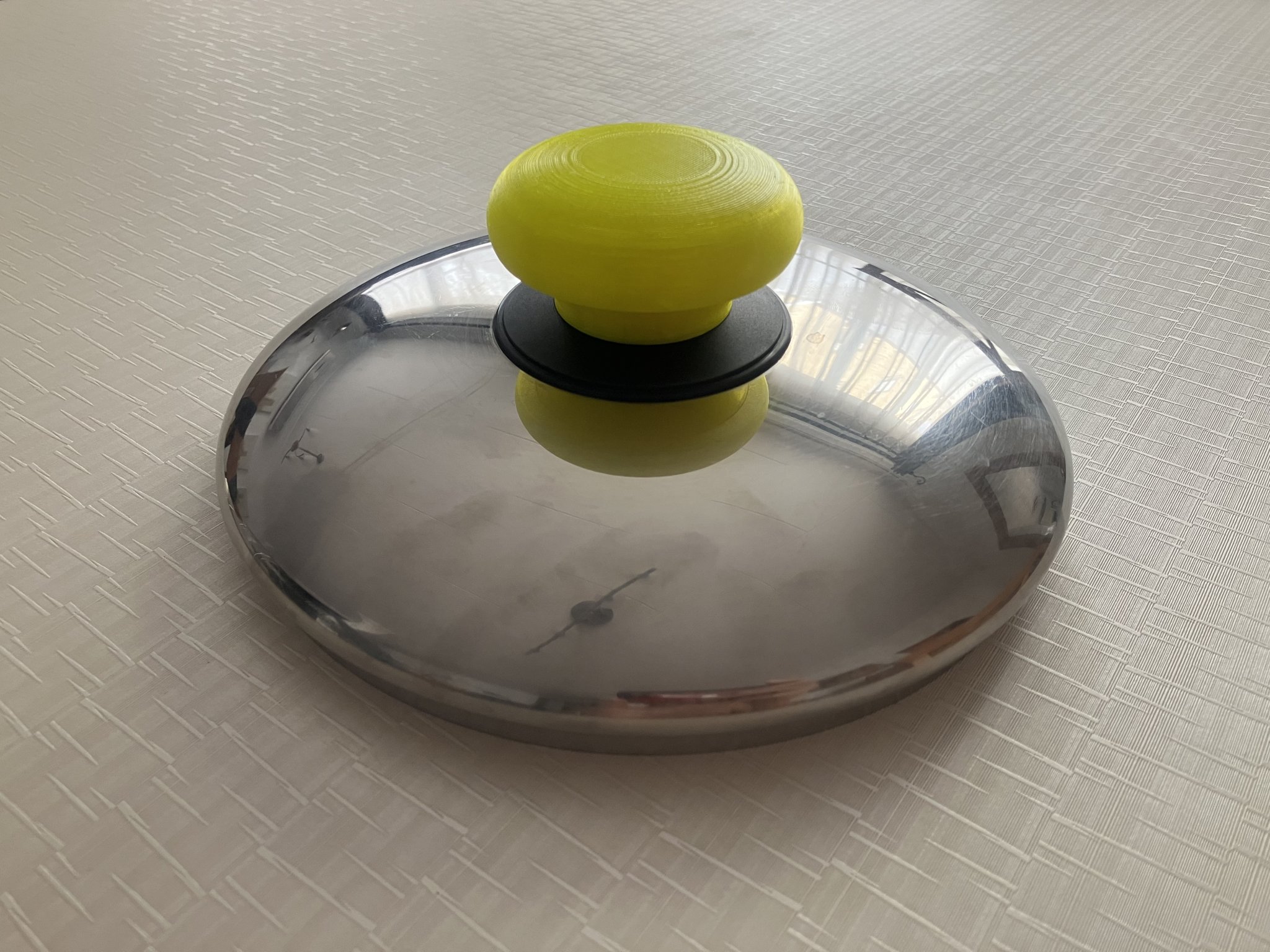 Thiết kế tay cầm cho nắp nồi thay thế