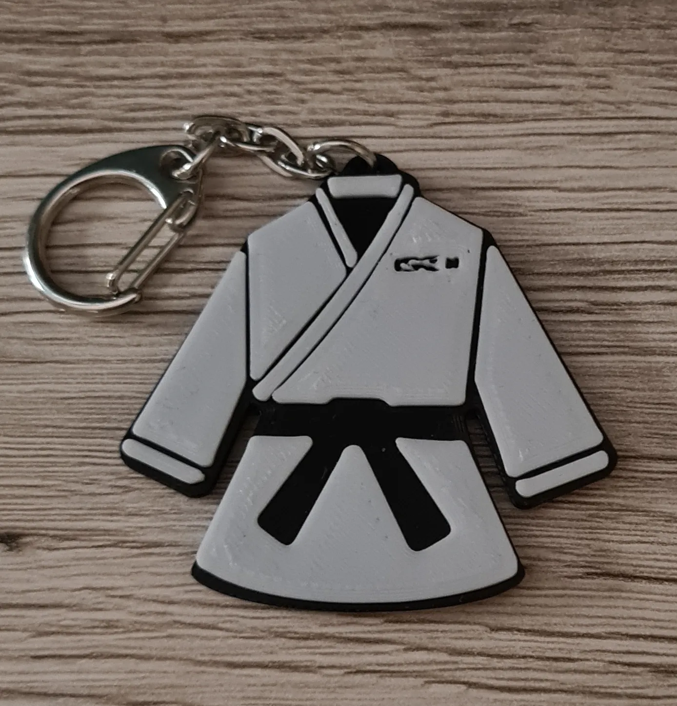 Móc khóa karate judo taekwondo in 2 màu sắc