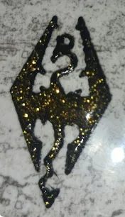 Móc chìa khóa hoặc bông tai huy hiệu Đế chế Skyrim