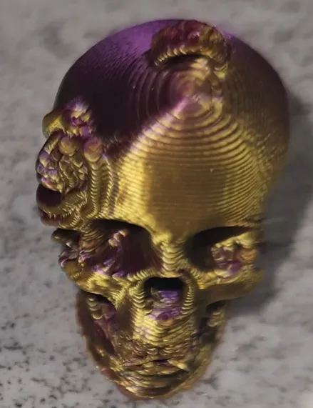 Nhẫn tai hình đầu lâu với hoa hồng trang trí