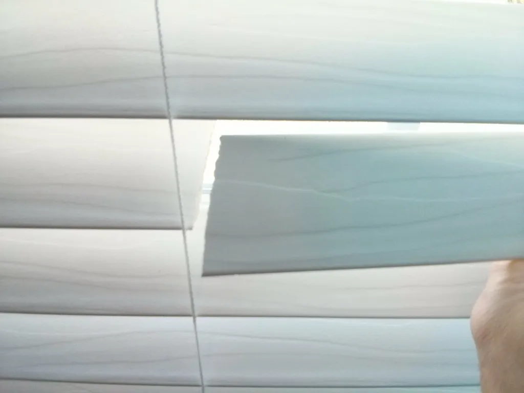 Bọc sửa chữa lá rèm cửa sổ hỏng