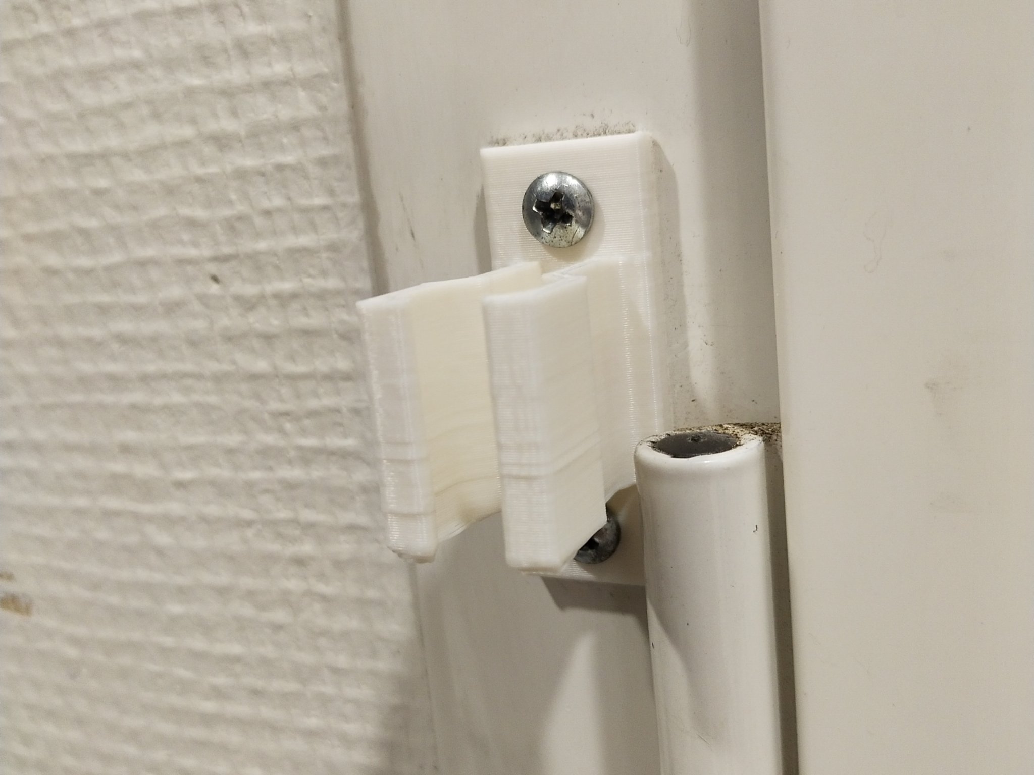 Kẹp giữ trục điều khiển cho rèm cửa