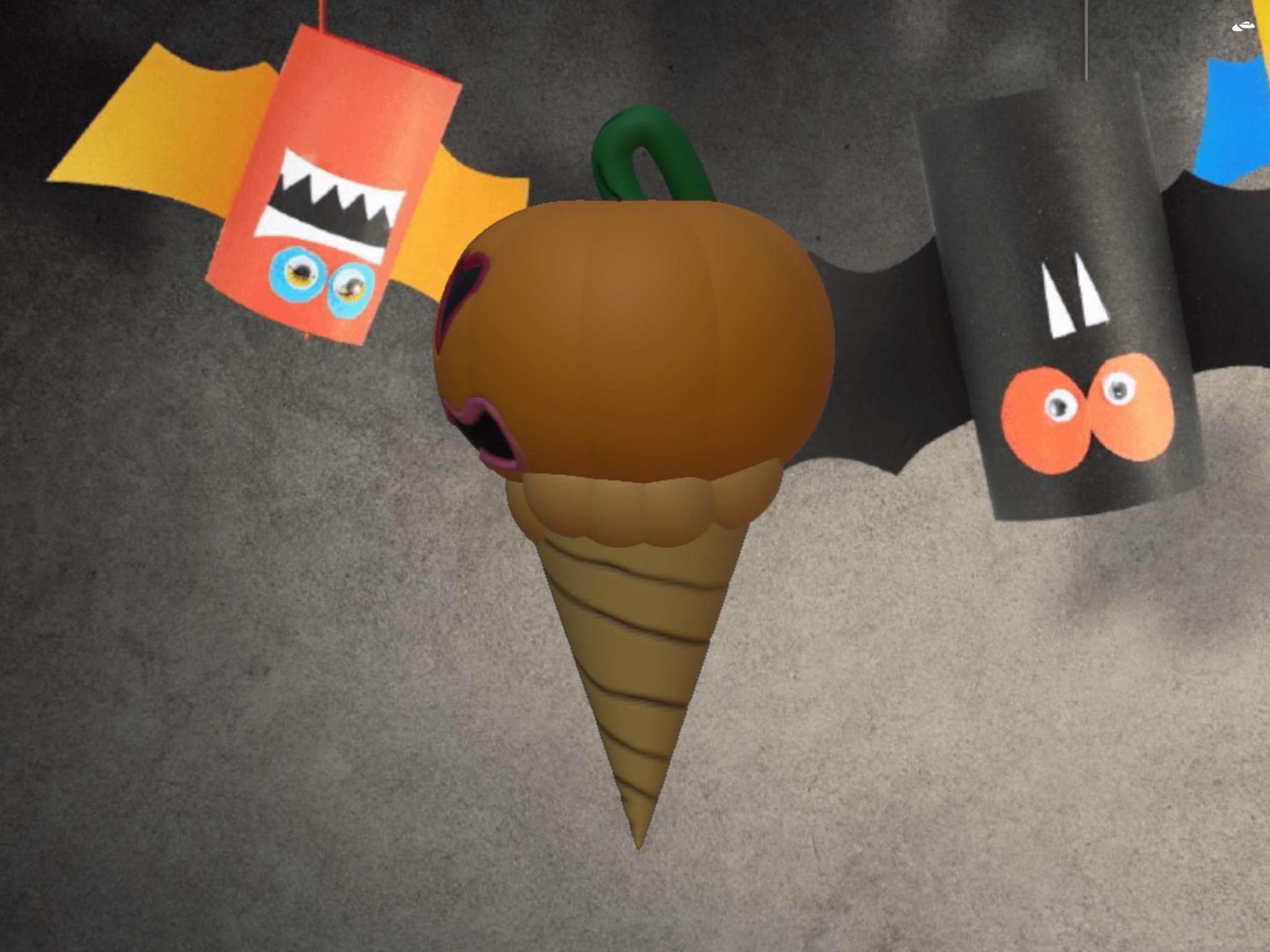 Bánh kem hình bí ngô Halloween trong ốc quế