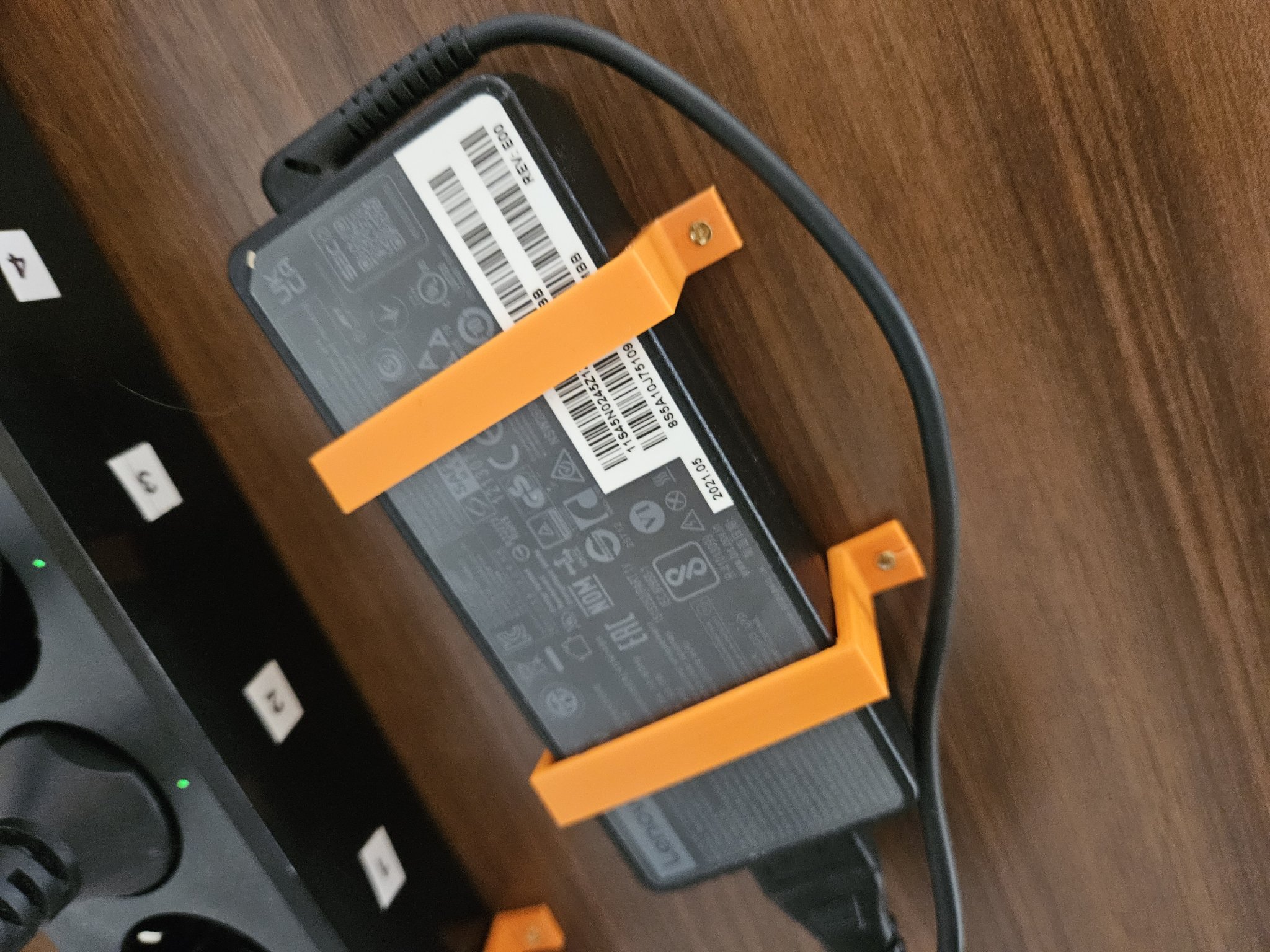 Giá đỡ nguồn điện dưới bàn cho màn hình Philips và trạm doc...