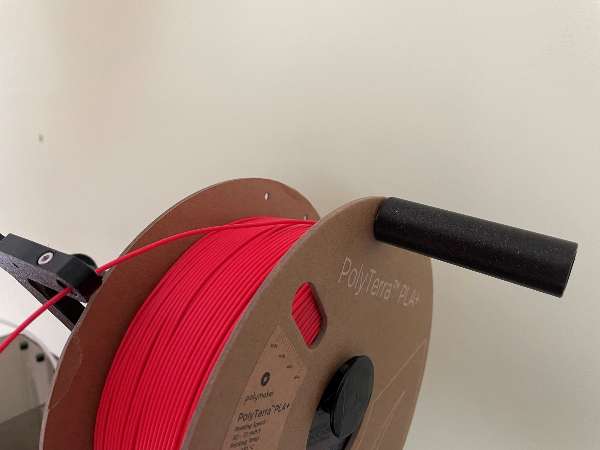 Cán tay nạp lại cuộn filament thủ công