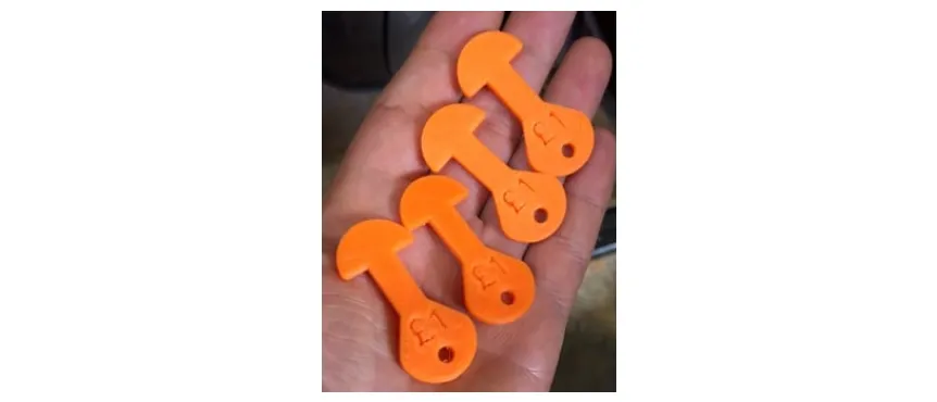 Token xe đẩy tháo rời cho siêu thị tại Anh