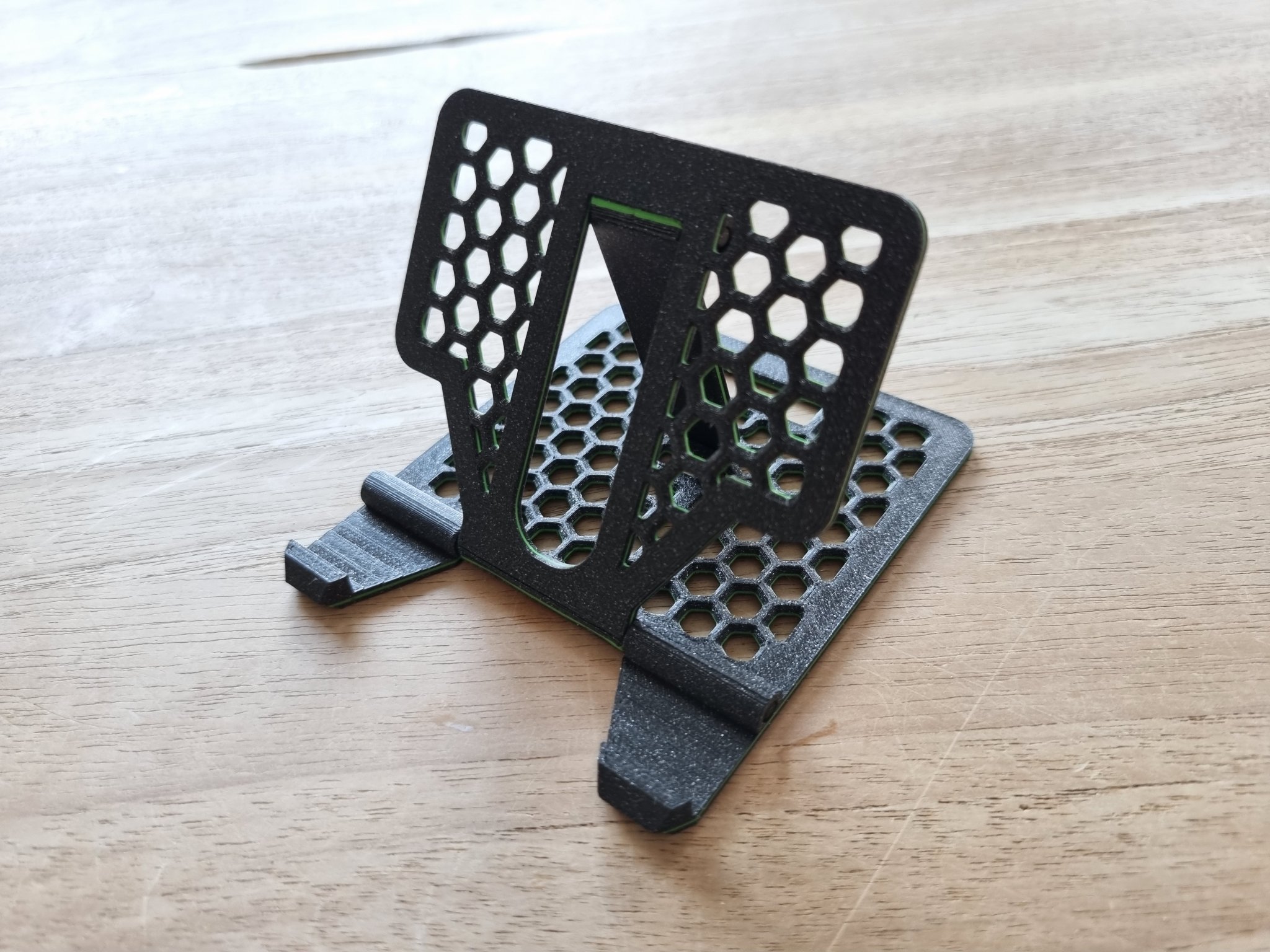 Giá đỡ điện thoại tổ ong có thể gập lại, điều chỉnh, nhiều màu sắc.