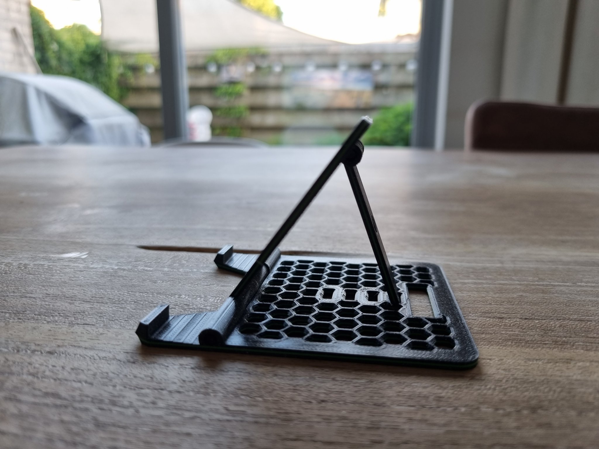 Giá đỡ điện thoại tổ ong có thể gập lại, điều chỉnh, nhiều màu sắc.