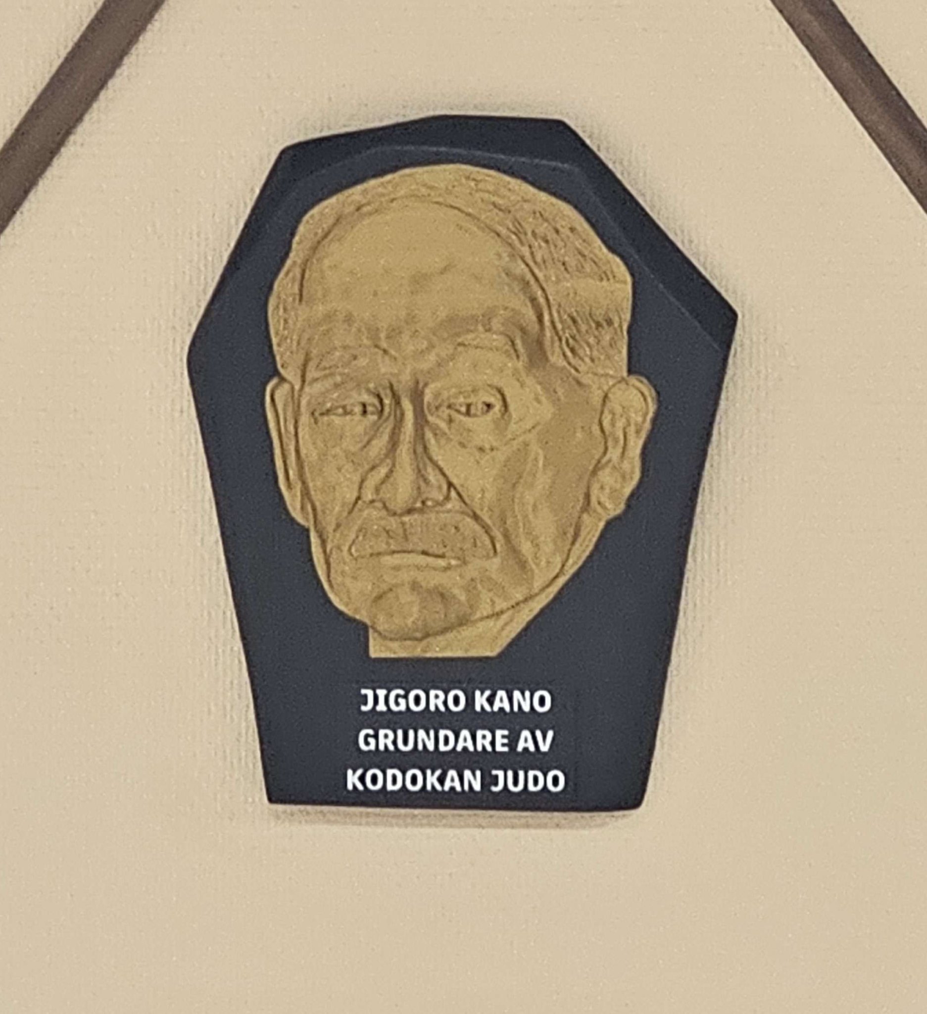 Biểu tượng Jigoro Kano cho câu lạc bộ Judo