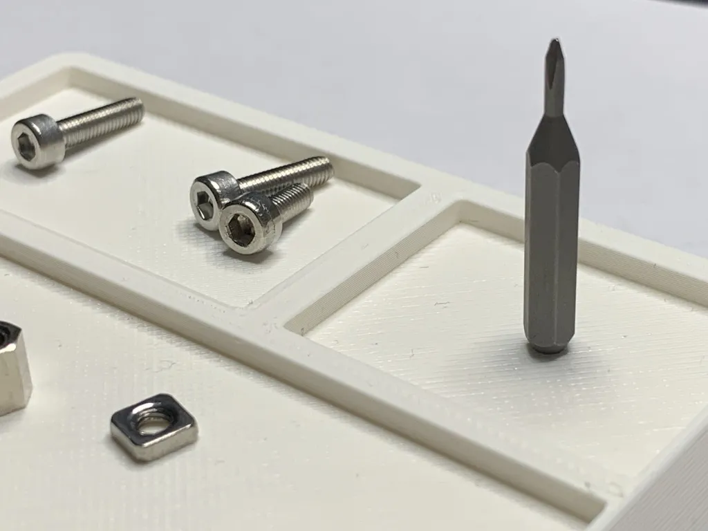 Giá đỡ cho linh kiện điện tử và bánh răng nhỏ