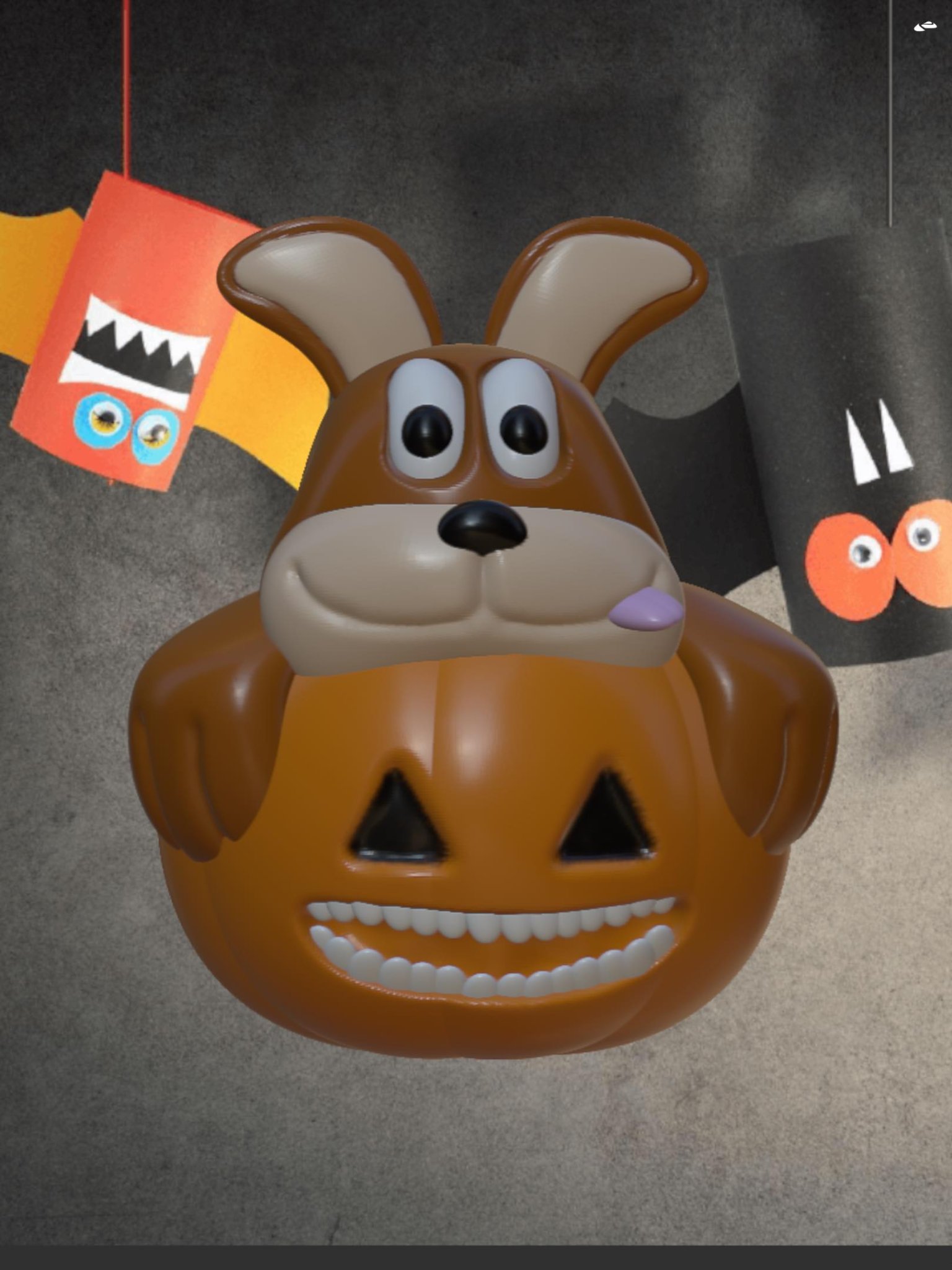 Chú chó con dễ thương ngồi trong quả bí ngô Halloween