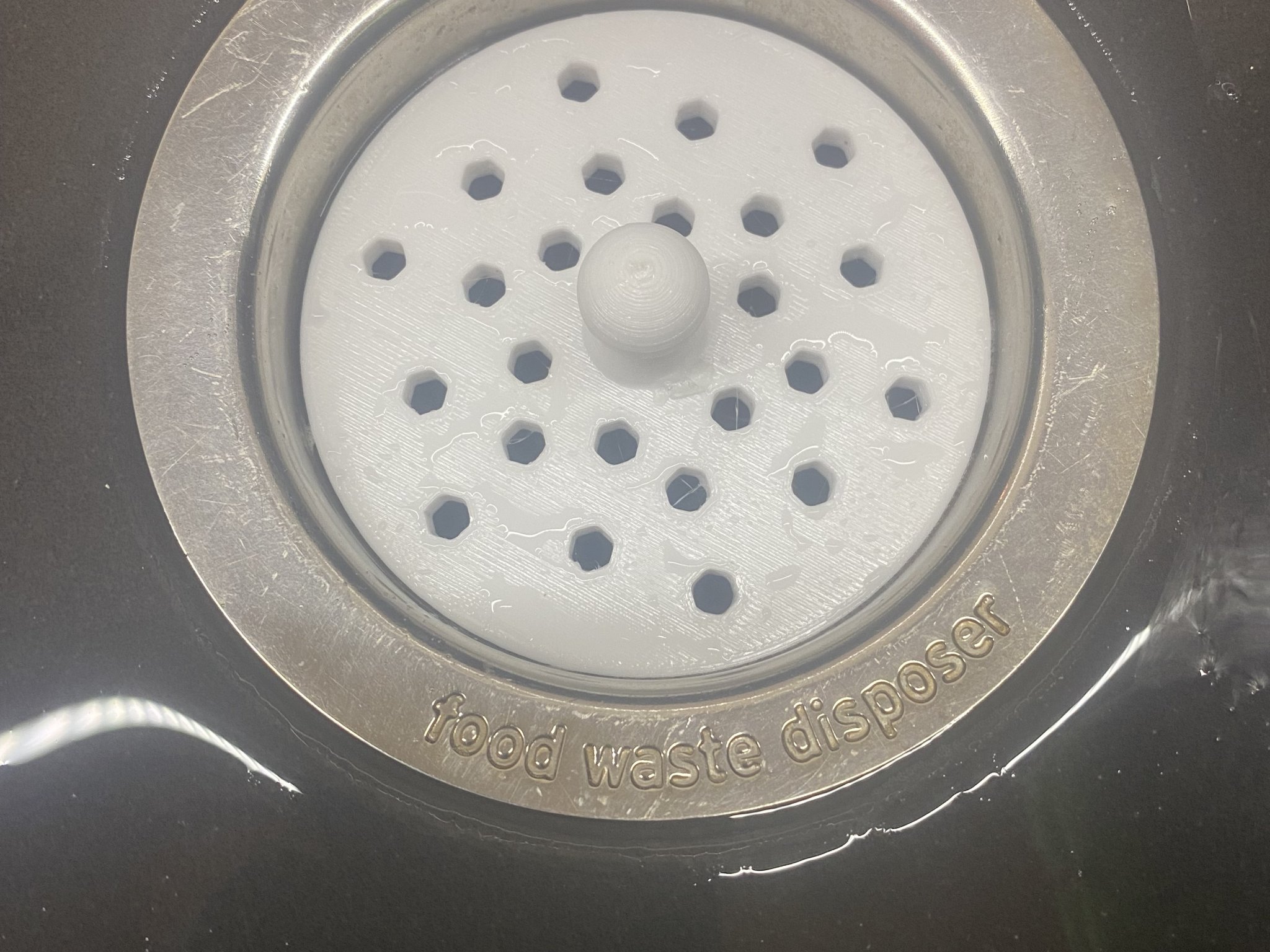 Nút chặn cho máy xay Insinkerator ngăn cản vật lạ