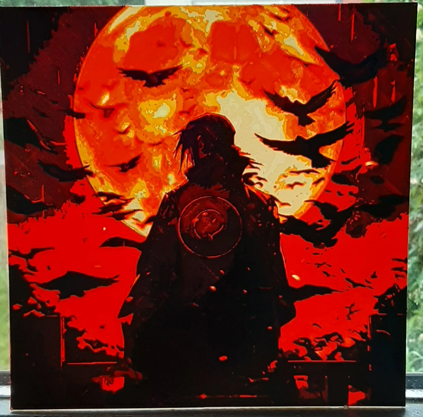 Itachi trong Naruto Shippuden bên ánh trăng lớn