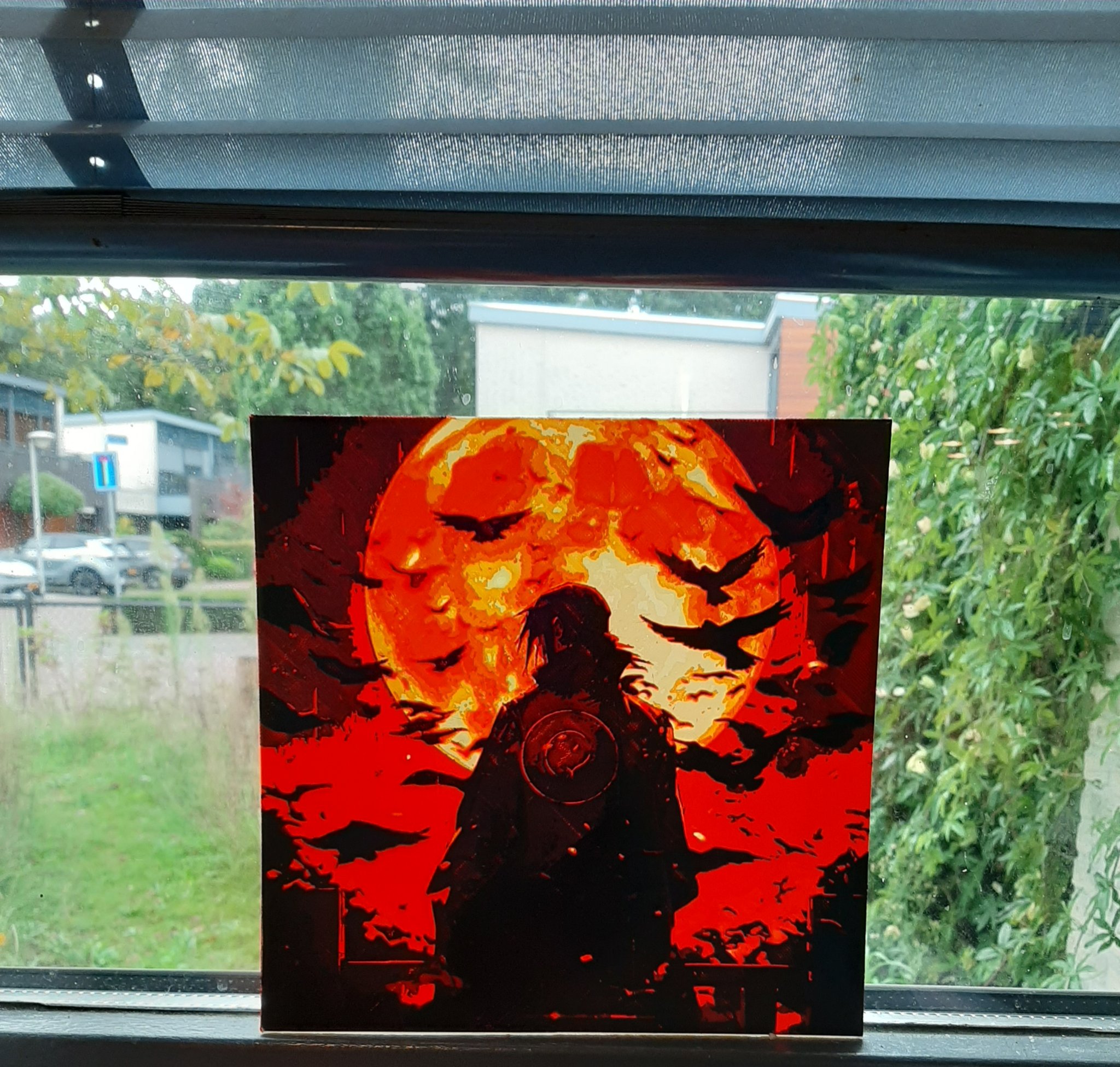 Itachi trong Naruto Shippuden bên ánh trăng lớn