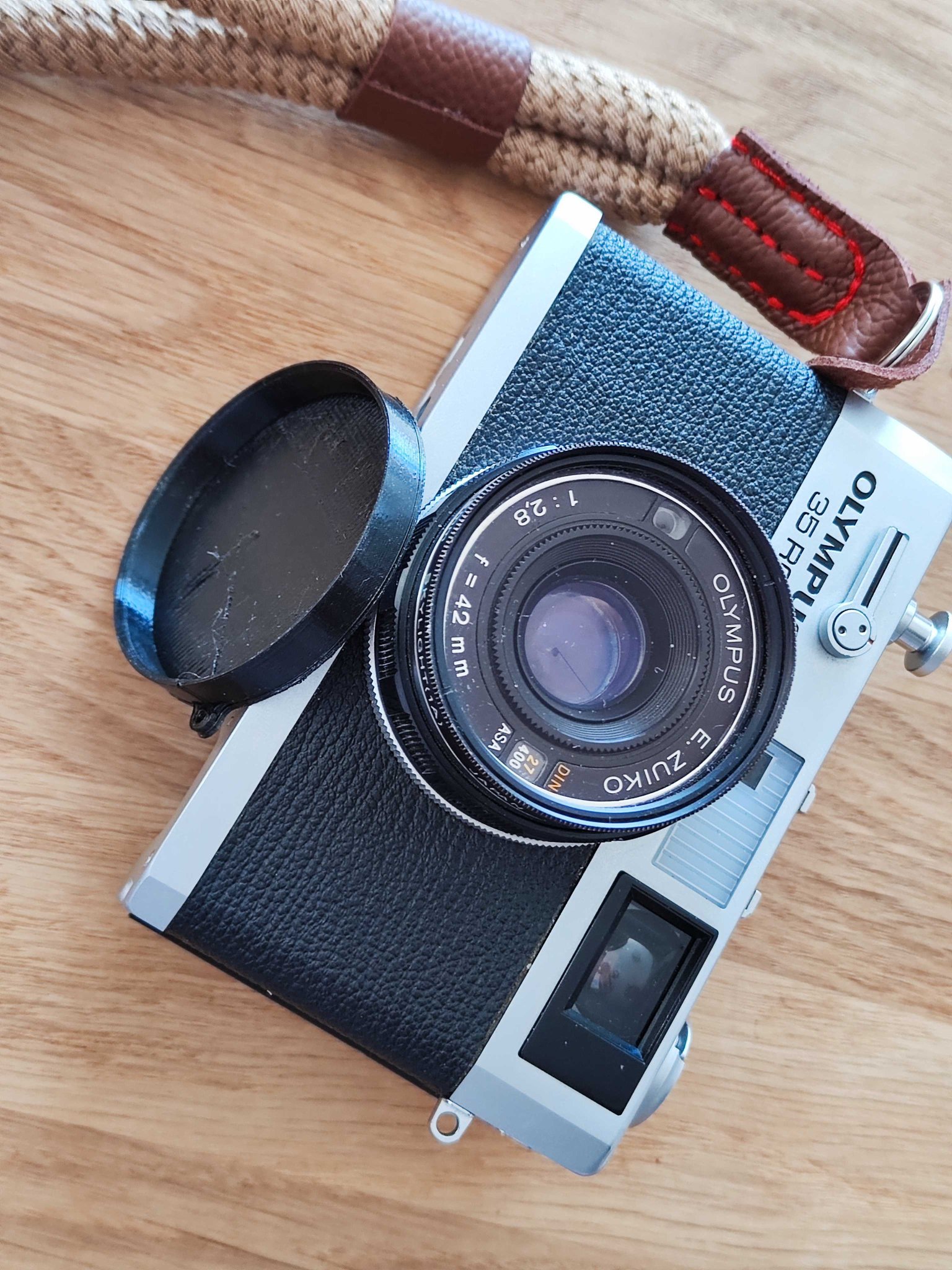 Nắp đậy ống kính cho máy ảnh Olympus 35 RC Zuiko 42/2,8