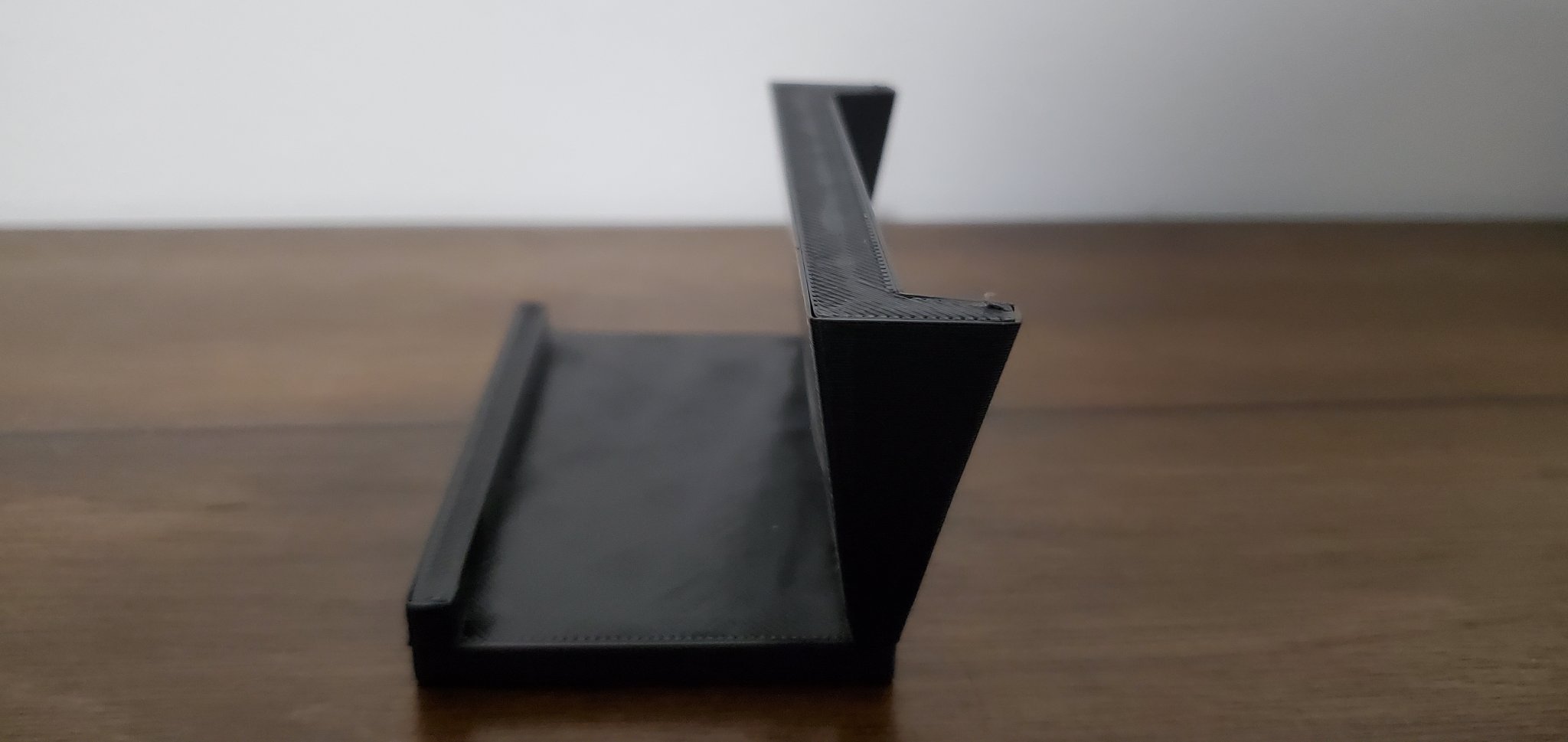 Giá đỡ điện thoại trừu tượng với vành giữ chống trượt