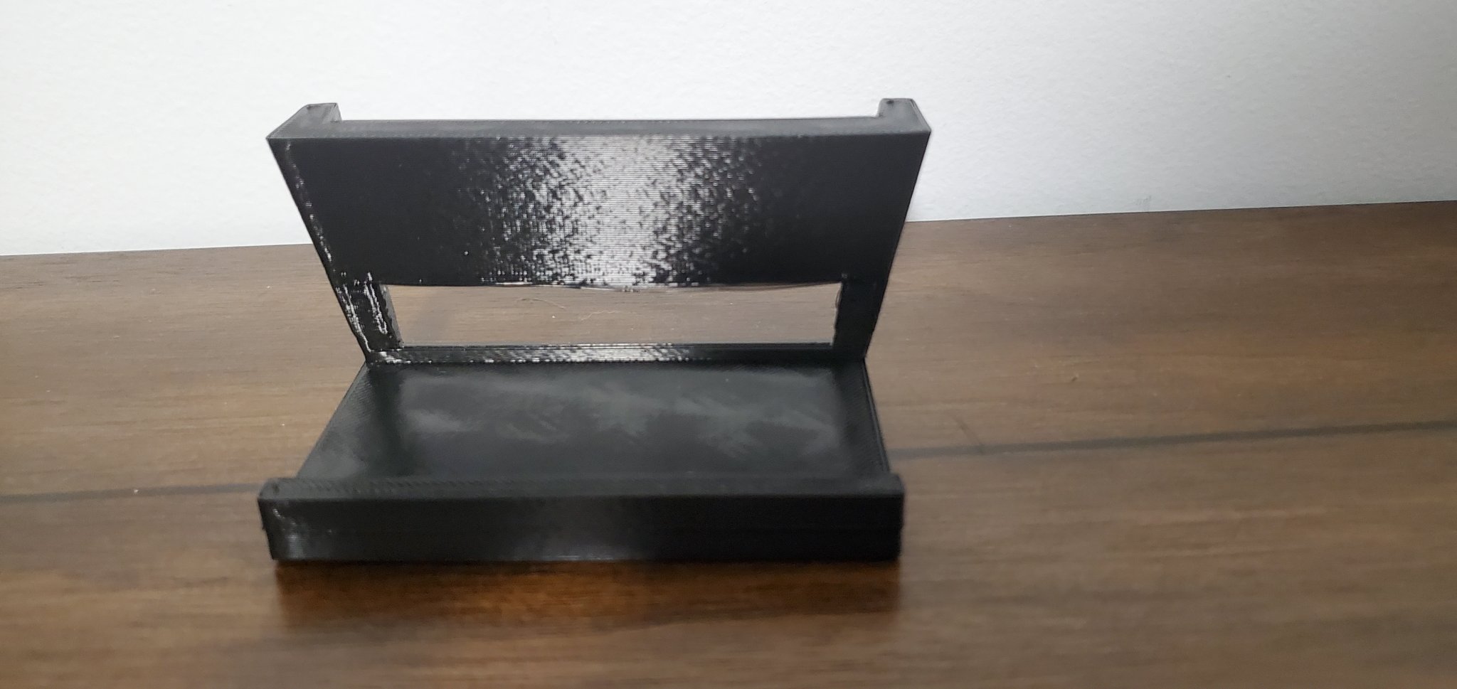 Giá đỡ điện thoại trừu tượng với vành giữ chống trượt