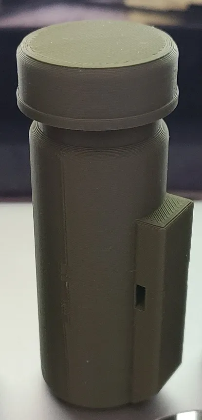 Bình chứa geocaching gắn bằng dây zip