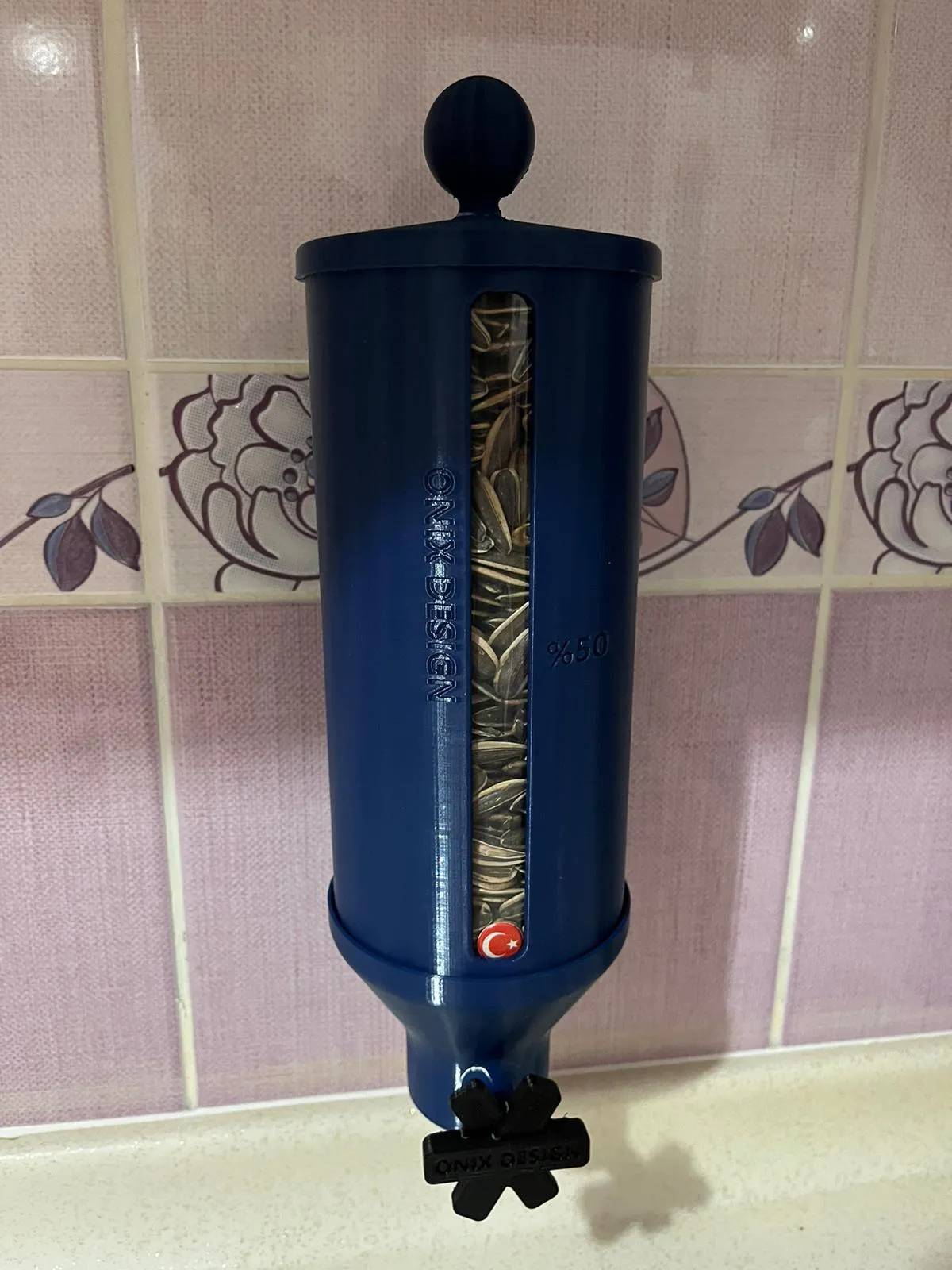 Máy phân phối thức ăn khô kiểu carousel