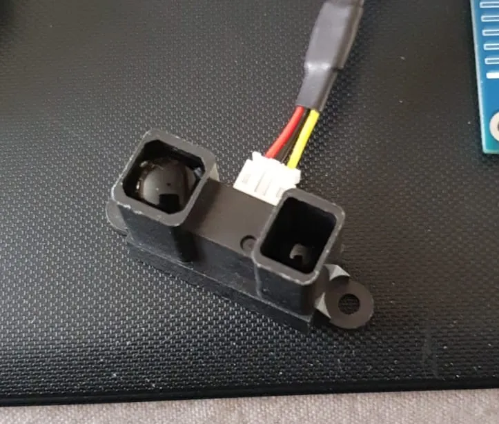 Vỏ và giá đỡ cảm biến Sharp cho máy chơi phi tiêu