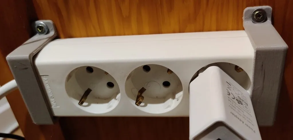 Giá đỡ cho ổ cắm điện gắn tường hoặc bàn