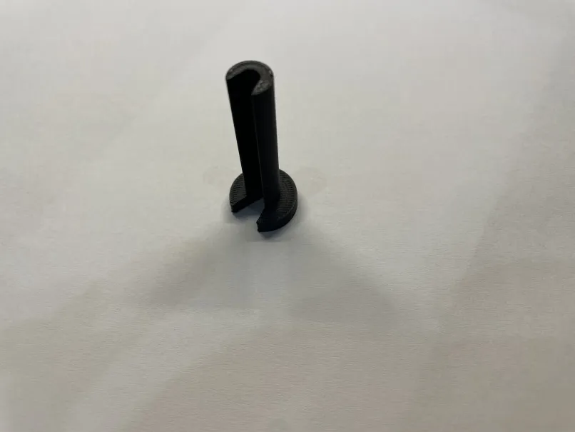 Trợ thủ nhỏ để tháo ống PTFE từ bộ đệm filament AMS