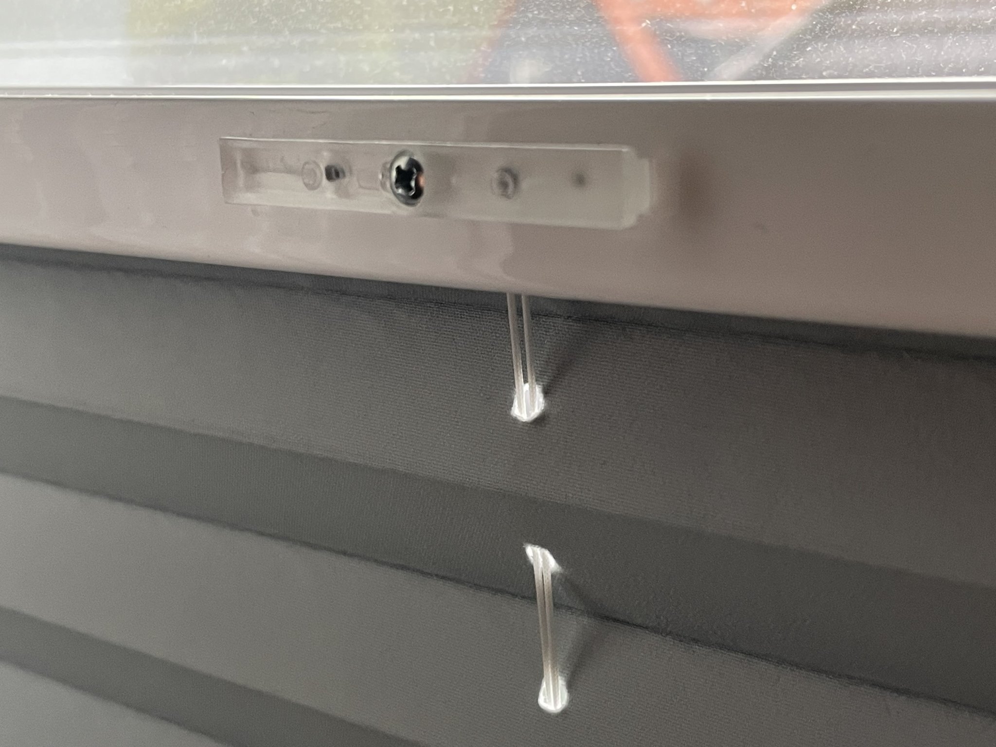 Tay cầm điều chỉnh plissee lên xuống