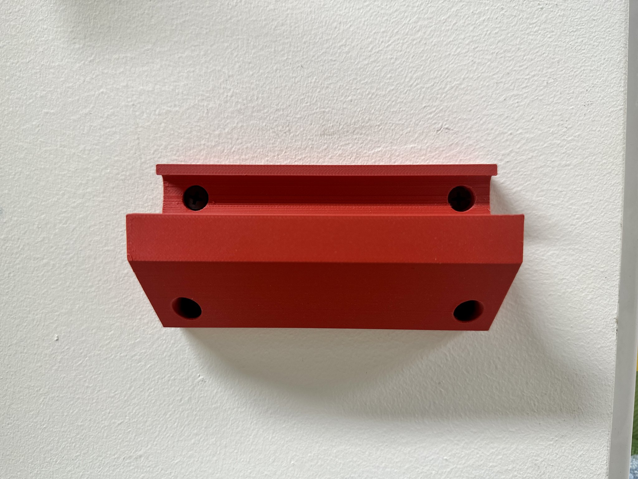 Giá treo máy bơm hơi Milwaukee M12 trên tường