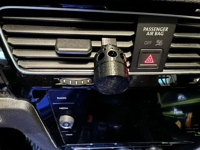 Giá đỡ hương liệu gắn cửa gió ô tô