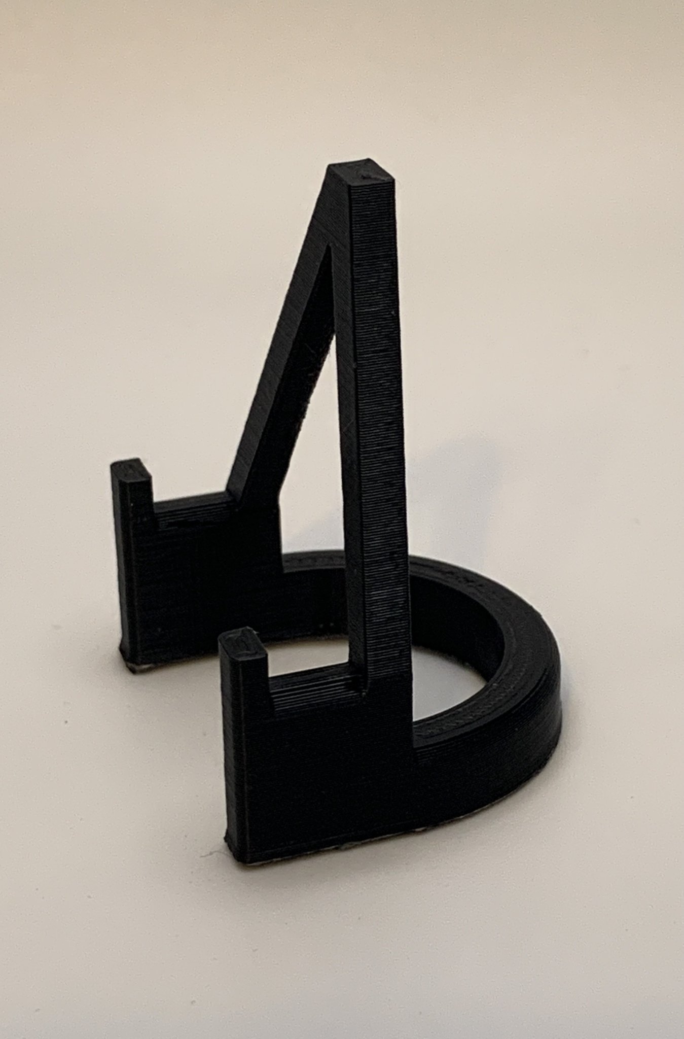 Giá đỡ biểu tượng 3D AXM đẹp mắt