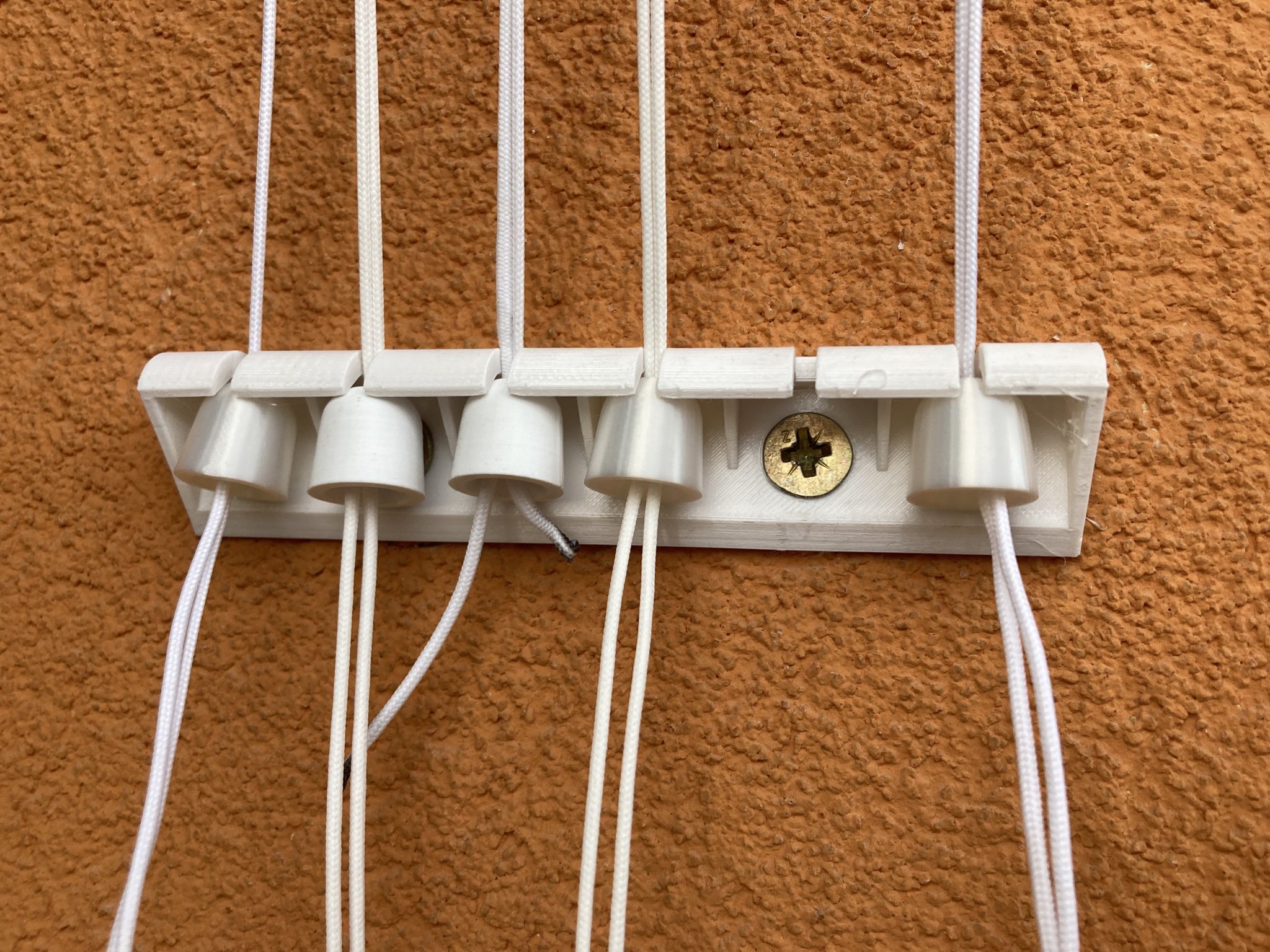 Giá đỡ dây cho máy sấy quần áo treo trần