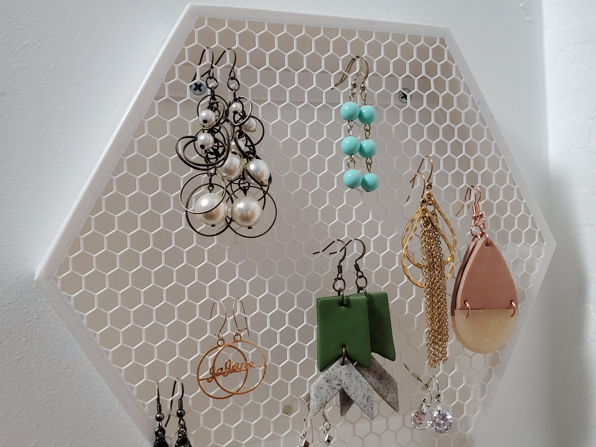 Giá đỡ hoa tai hình lục giác gắn tường