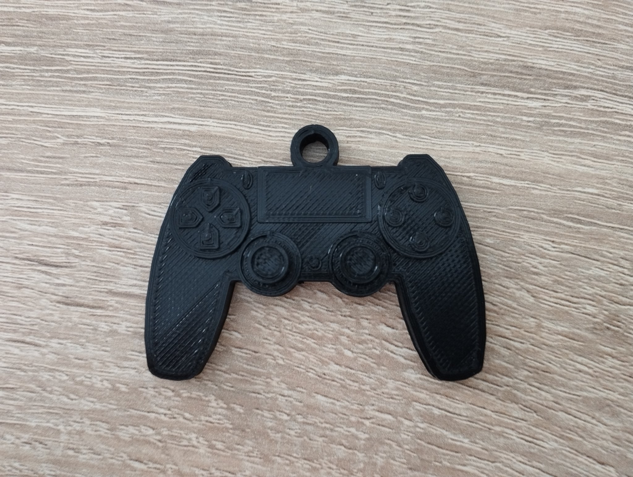 Móc khóa joystick PS4 đơn giản