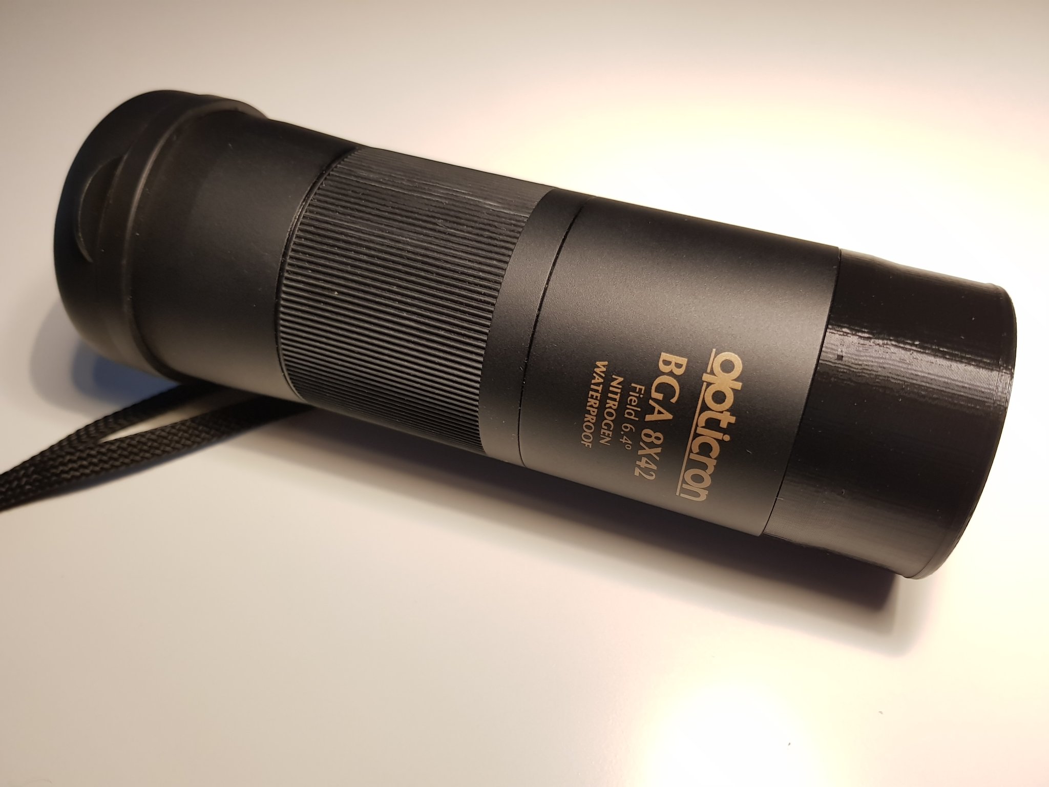 Nắp ống kính cho ống nhòm Opticron BGA 8x42