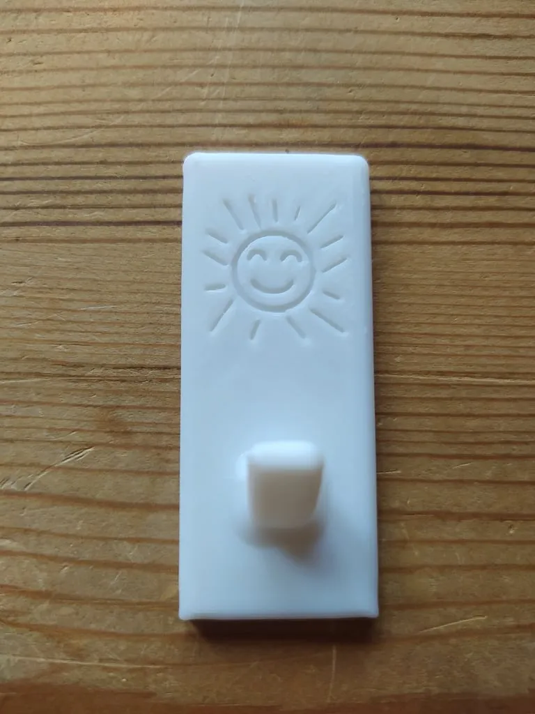 Giá treo khăn với hình mặt trời