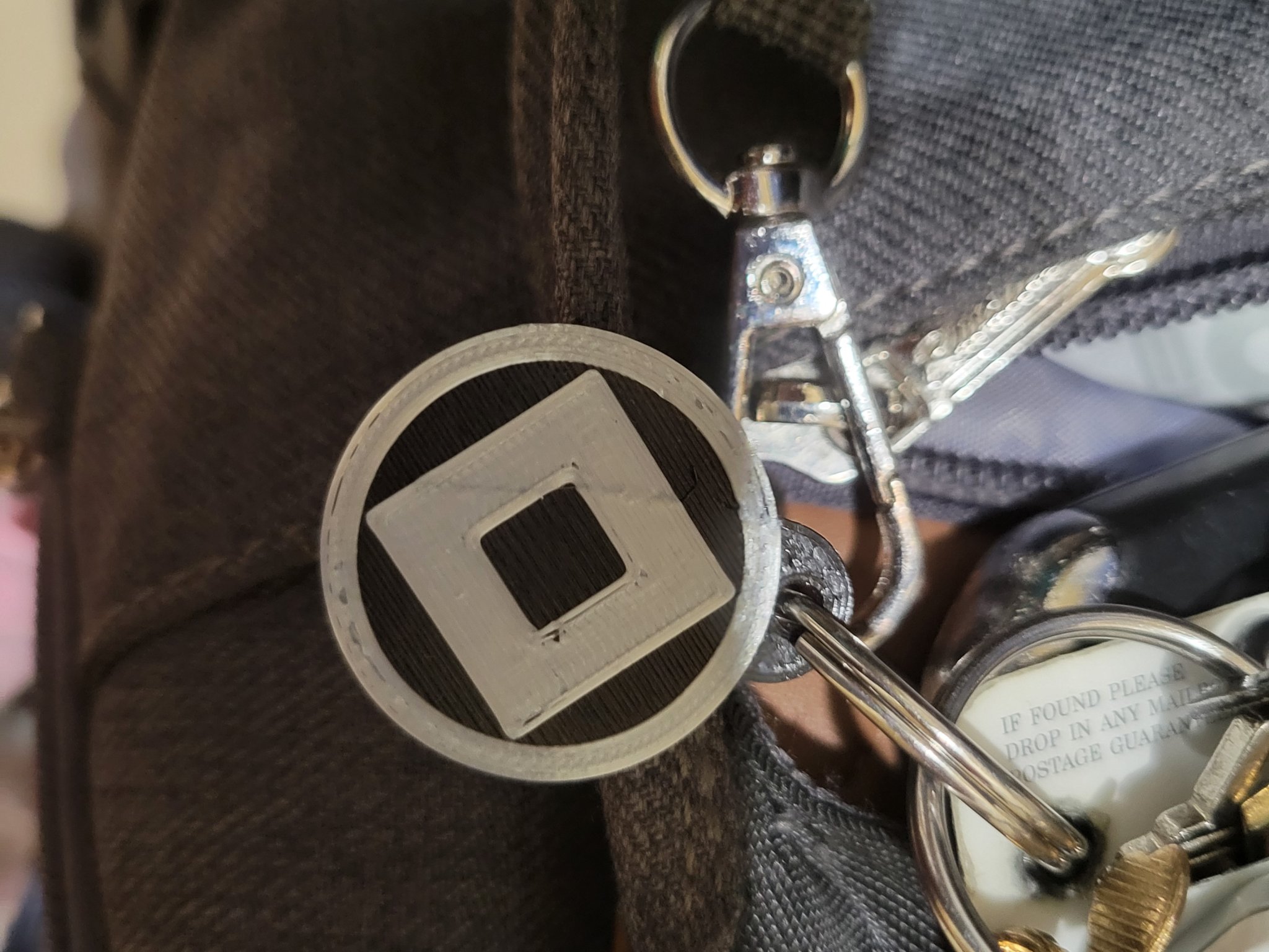 Móc khóa với biểu tượng gia đình Miyasaki