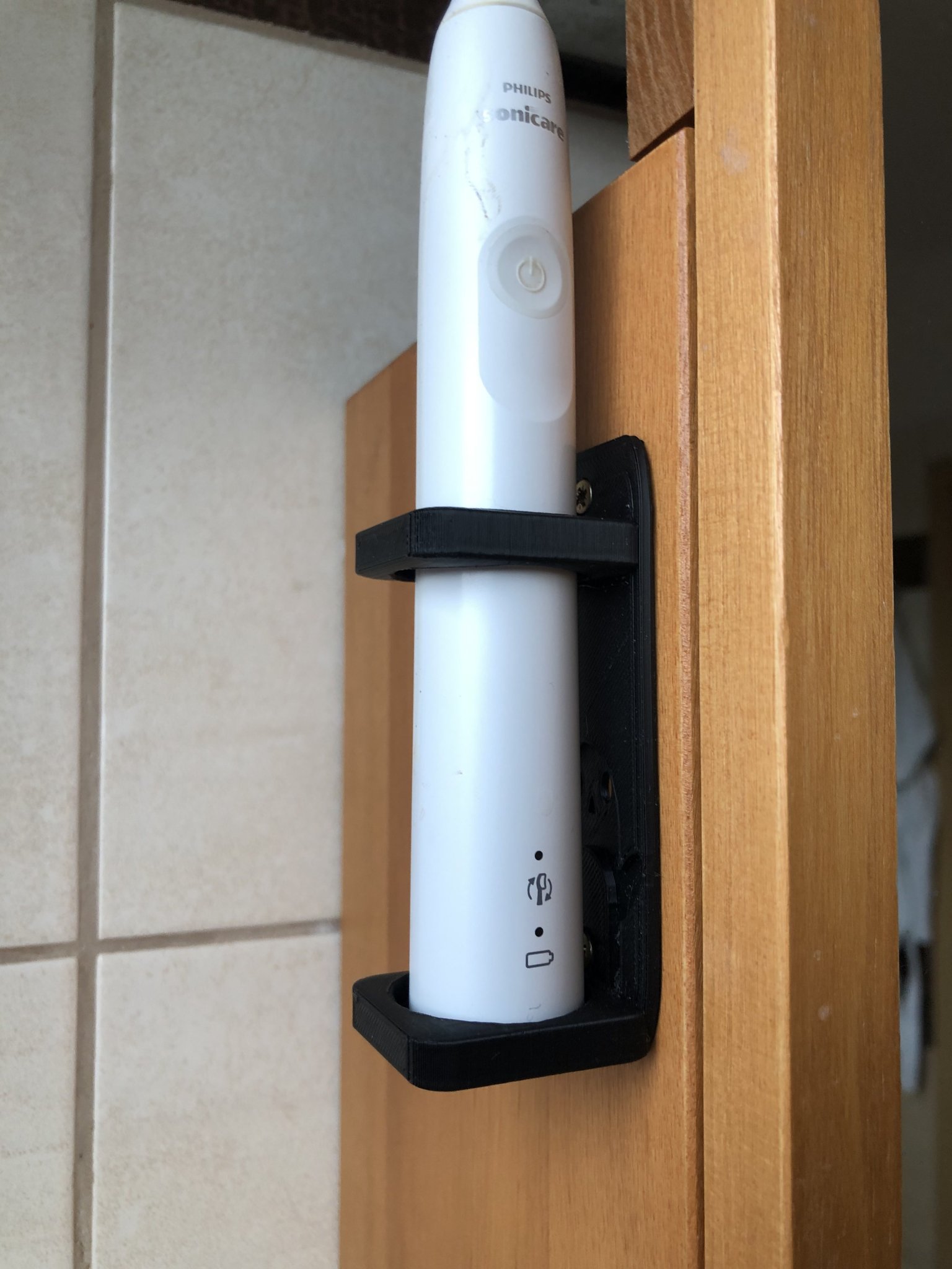 Giá đỡ bàn chải điện hình chim cánh cụt