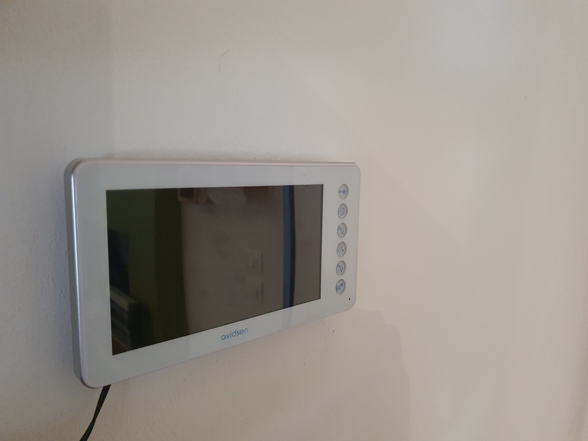 Giá đỡ tường cho điện thoại video Avidsen