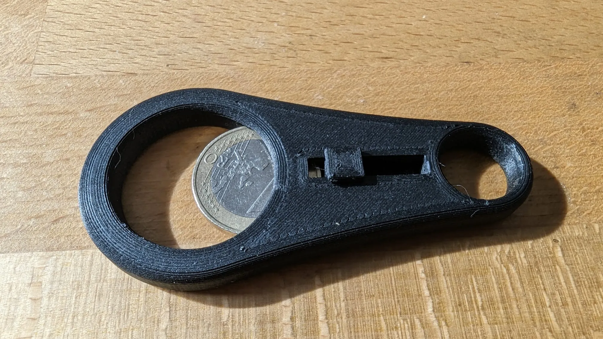 Mở nắp chai và giữ tiền xu xe đẩy trên móc khóa