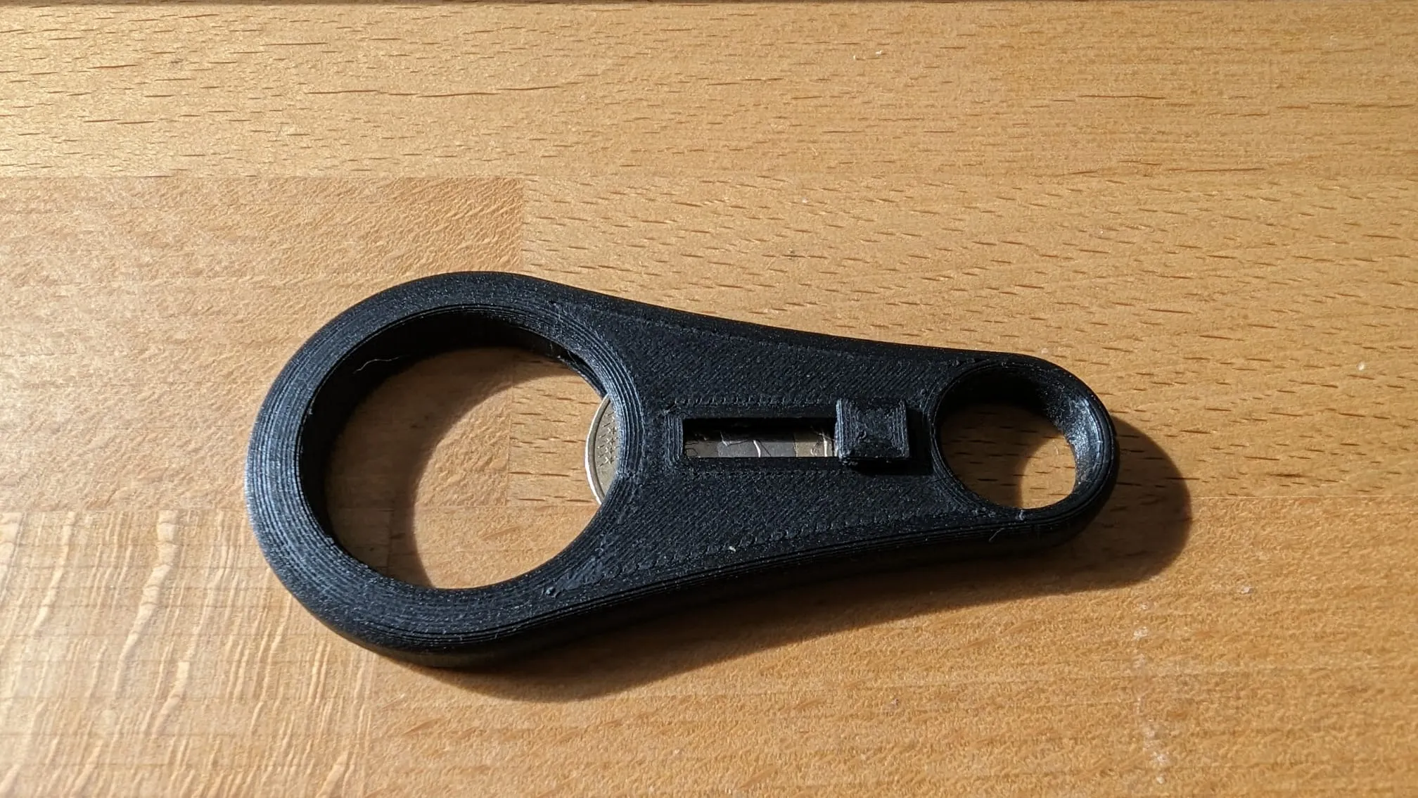 Mở nắp chai và giữ tiền xu xe đẩy trên móc khóa