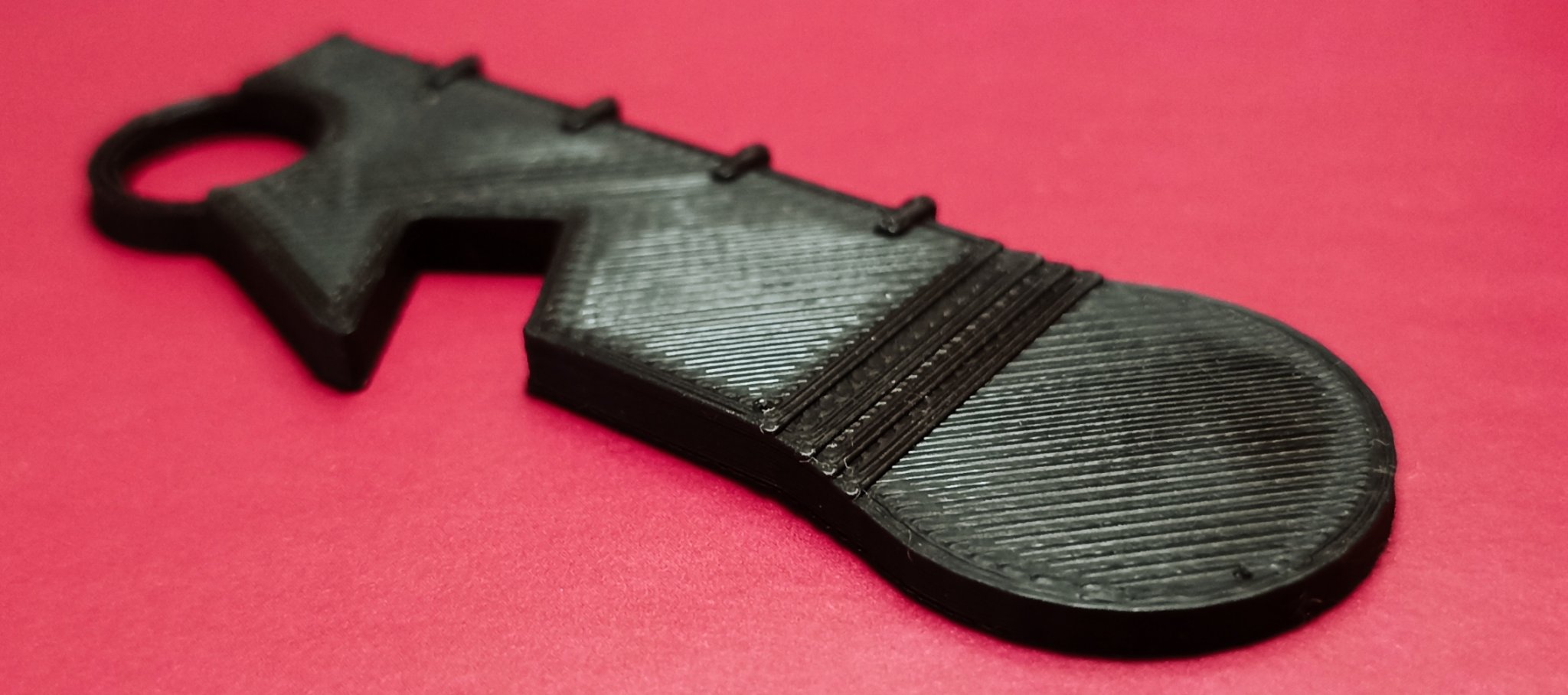 Móc chìa khóa đa năng với thước kẻ và mở nắp chai