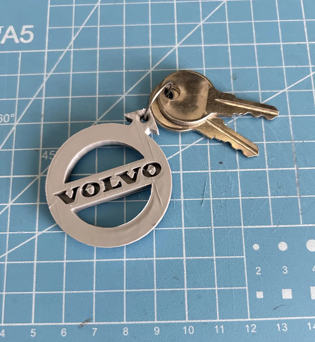 Móc khóa hình logo Volvo độc đáo cho người yêu xe hơi